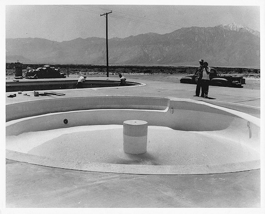 Dr. & Mrs Holmes viewing the construction of the pools